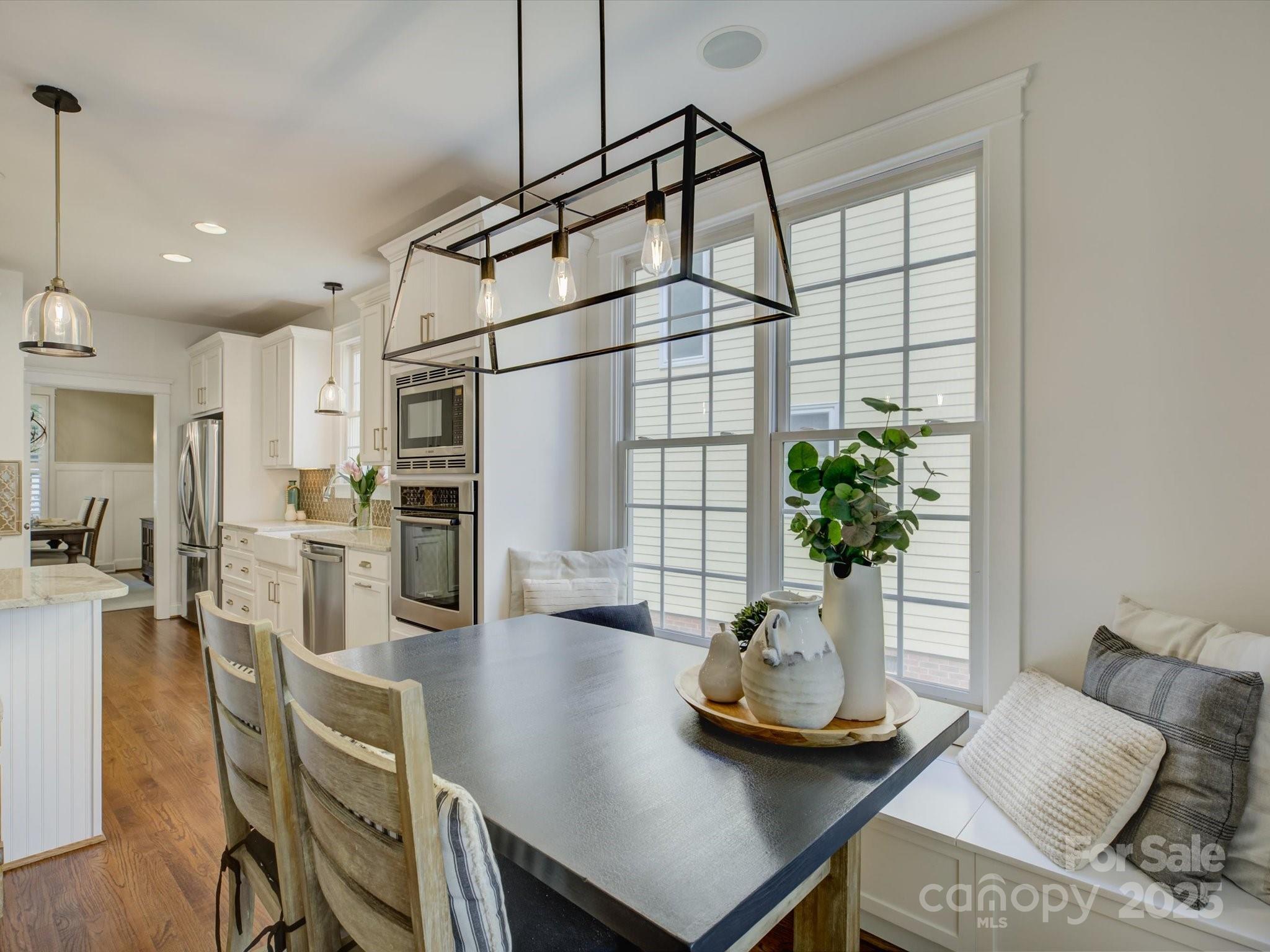 628 Bracket Street Fort Mill, SC 29708 - Photo 13 of 48 a view of a dining room with furniture