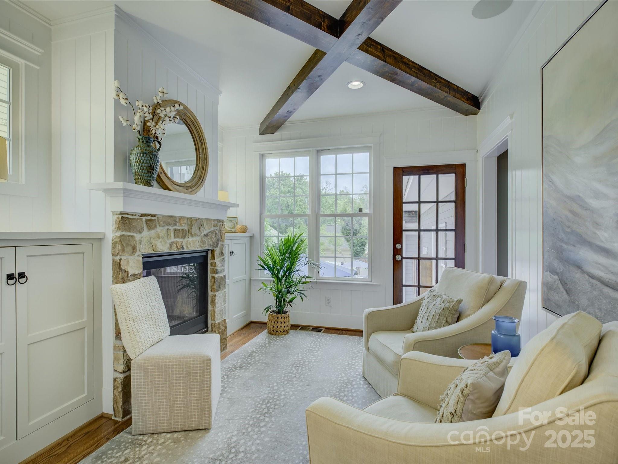 628 Bracket Street Fort Mill, SC 29708 - Photo 17 of 48 a living room with furniture and a fireplace