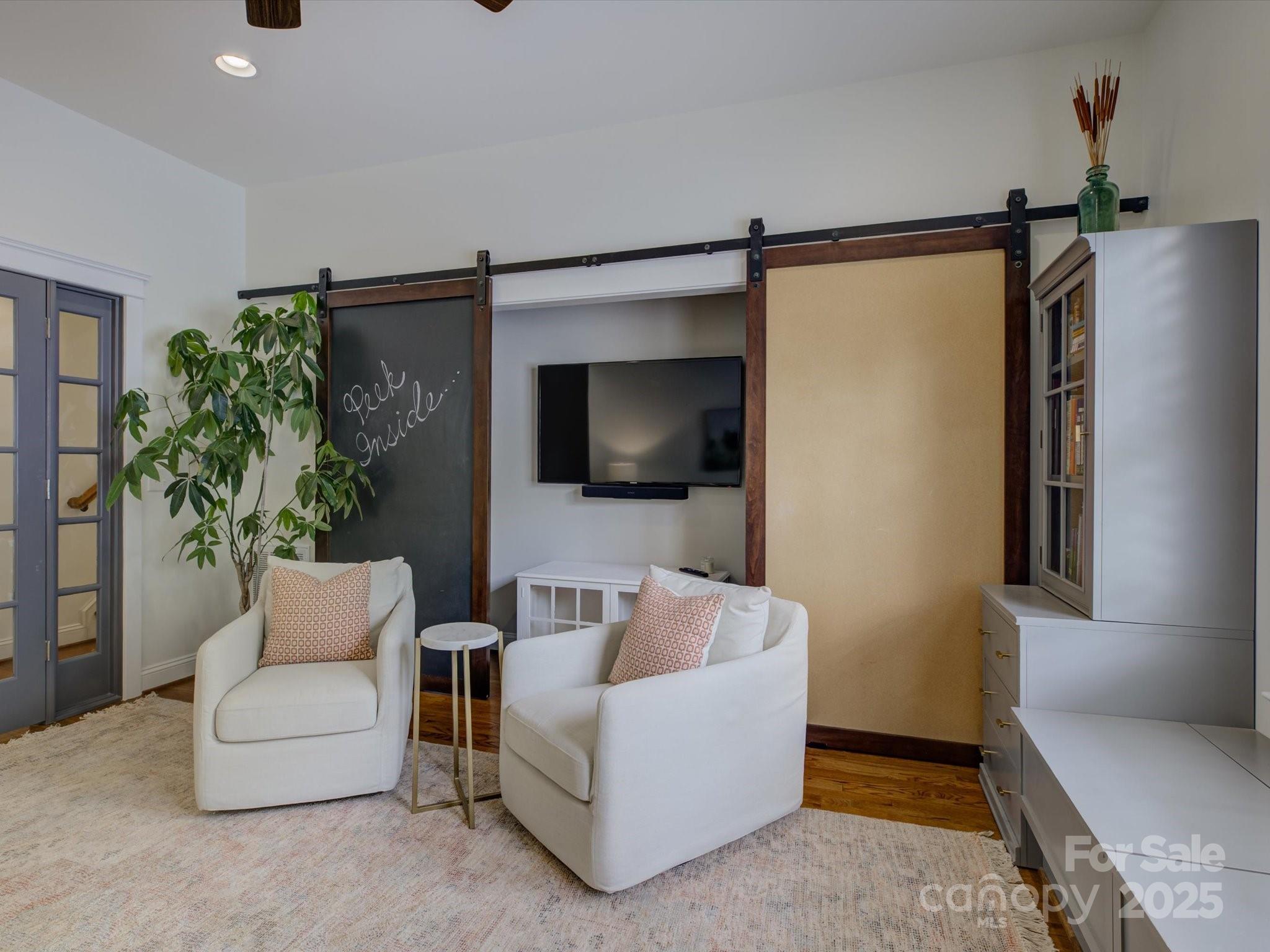 628 Bracket Street Fort Mill, SC 29708 - Photo 19 of 48 a living room with furniture and a flat screen tv