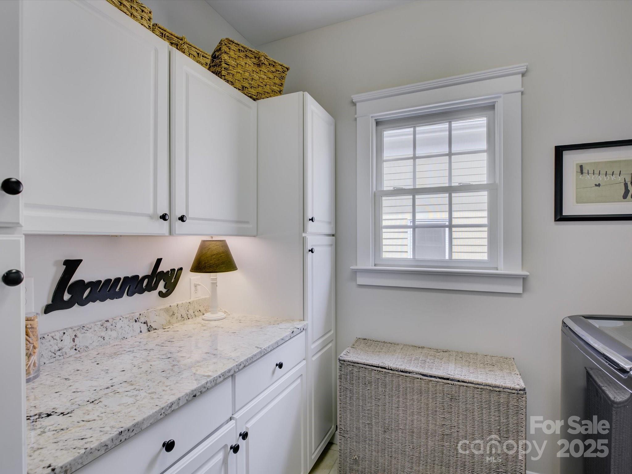 628 Bracket Street Fort Mill, SC 29708 - Photo 32 of 48 a kitchen with a sink and cabinets