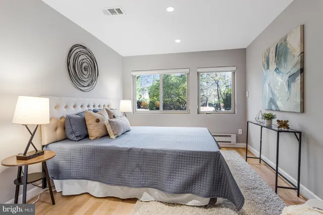 a view of a patio with table and chairs and wooden floor