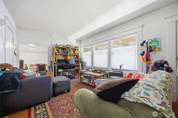 a bed room with two bed and a couch