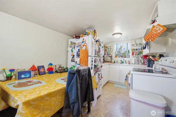 a storage room with washer and dryer