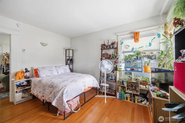 a bed room with a bed and a table