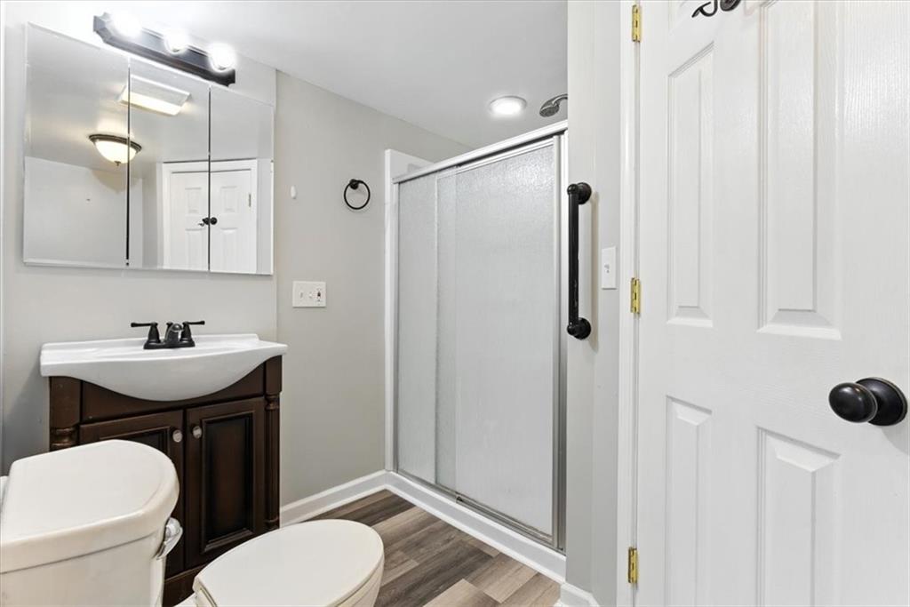 71 Kirk Road Northwest White, GA 30184 - Photo 21 of 74 a bathroom with a sink toilet and shower