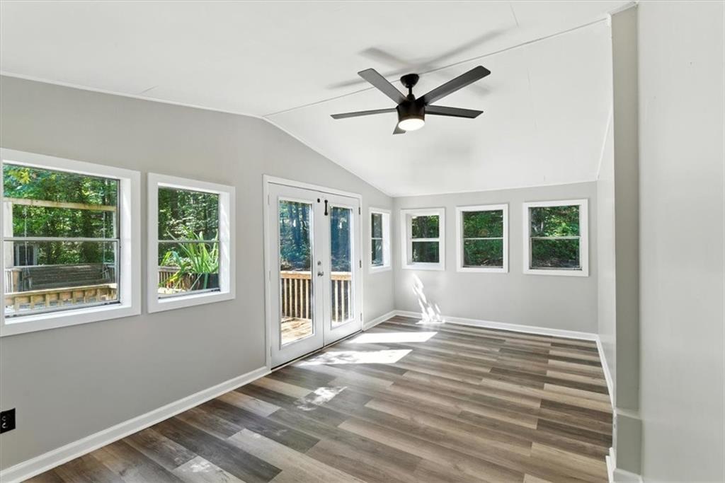 71 Kirk Road Northwest White, GA 30184 - Photo 22 of 74 a view of empty room with wooden floor and fan