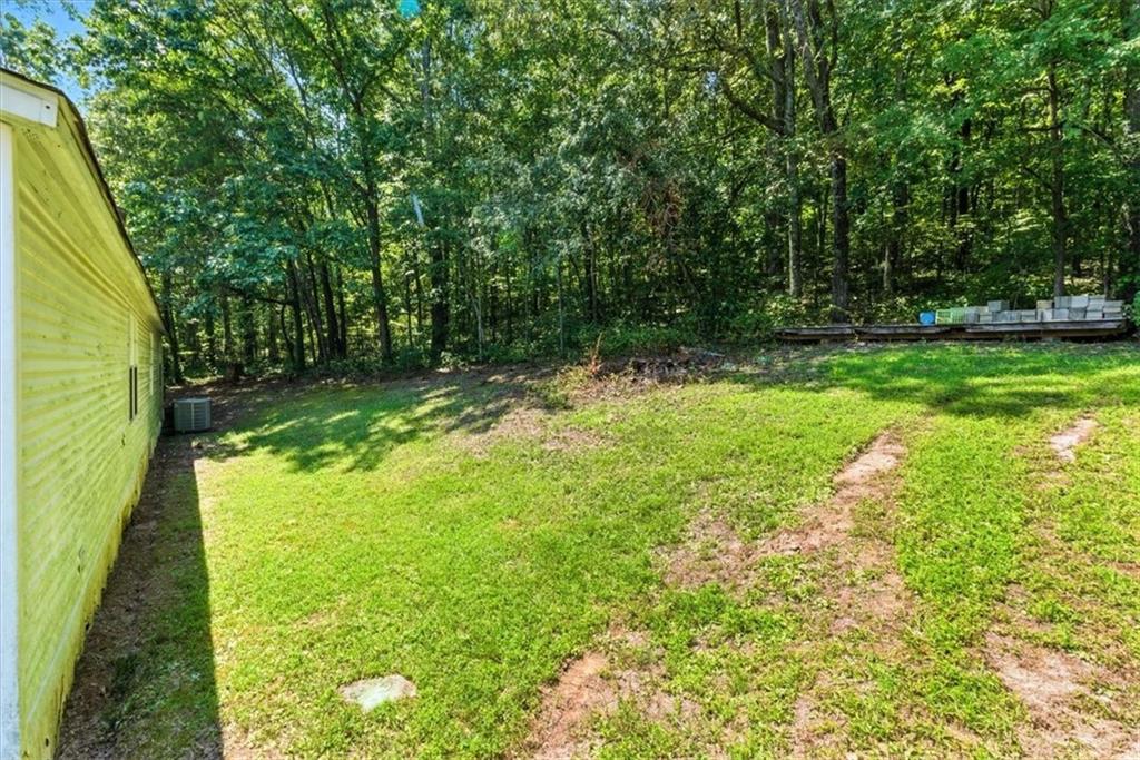 71 Kirk Road Northwest White, GA 30184 - Photo 32 of 74 a view of backyard with green space