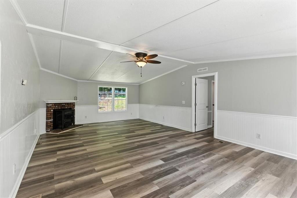 71 Kirk Road Northwest White, GA 30184 - Photo 5 of 74 a view of an empty room with a ceiling fan