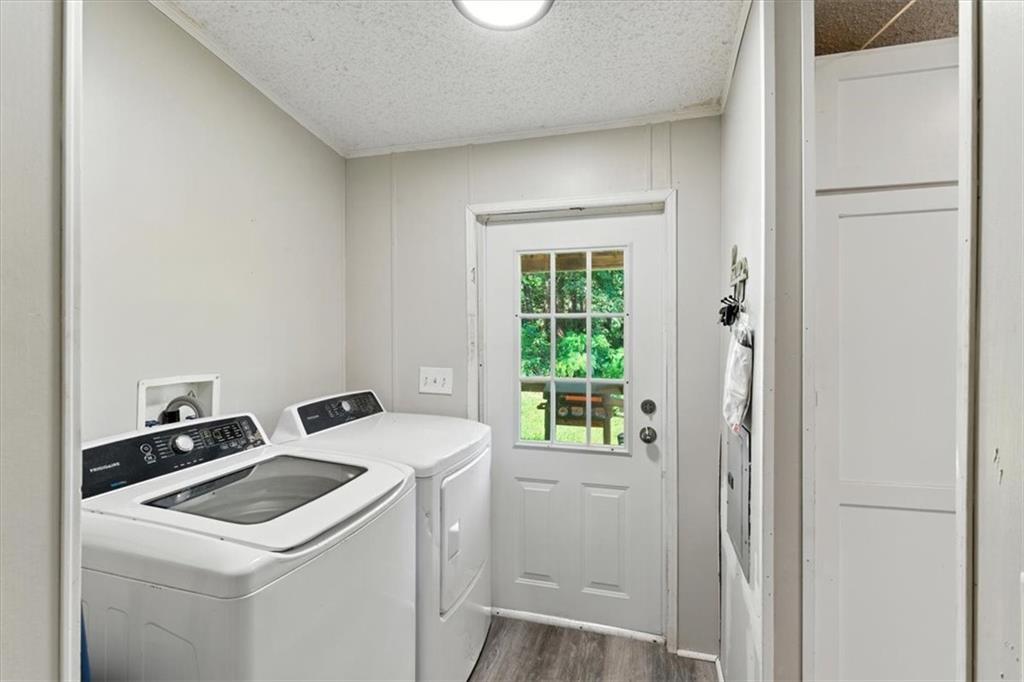71 Kirk Road Northwest White, GA 30184 - Photo 59 of 74 a utility room with dryer and washer