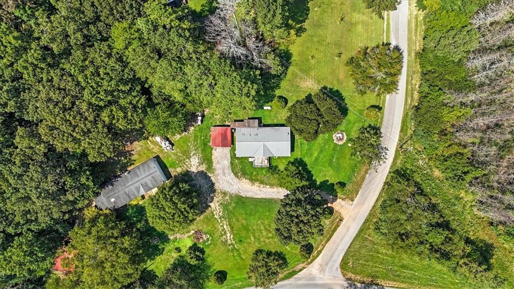 71 Kirk Road Northwest White, GA 30184 - Photo 68 of 74 an aerial view of residential house with outdoor space and trees all around