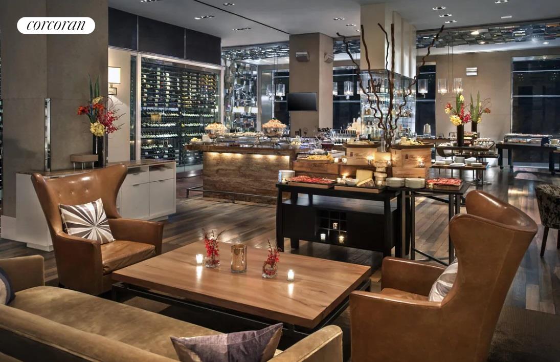 160 Central Park South, Unit 410 Manhattan, NY 10019 - Photo 11 of 17 a living room with furniture and chandelier