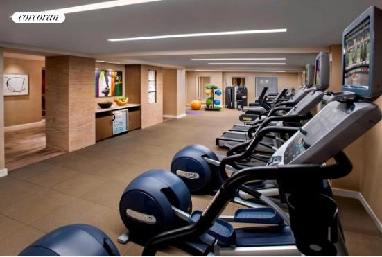 160 Central Park South, Unit 410 Manhattan, NY 10019 - Photo 14 of 17 a view of a room with gym equipment