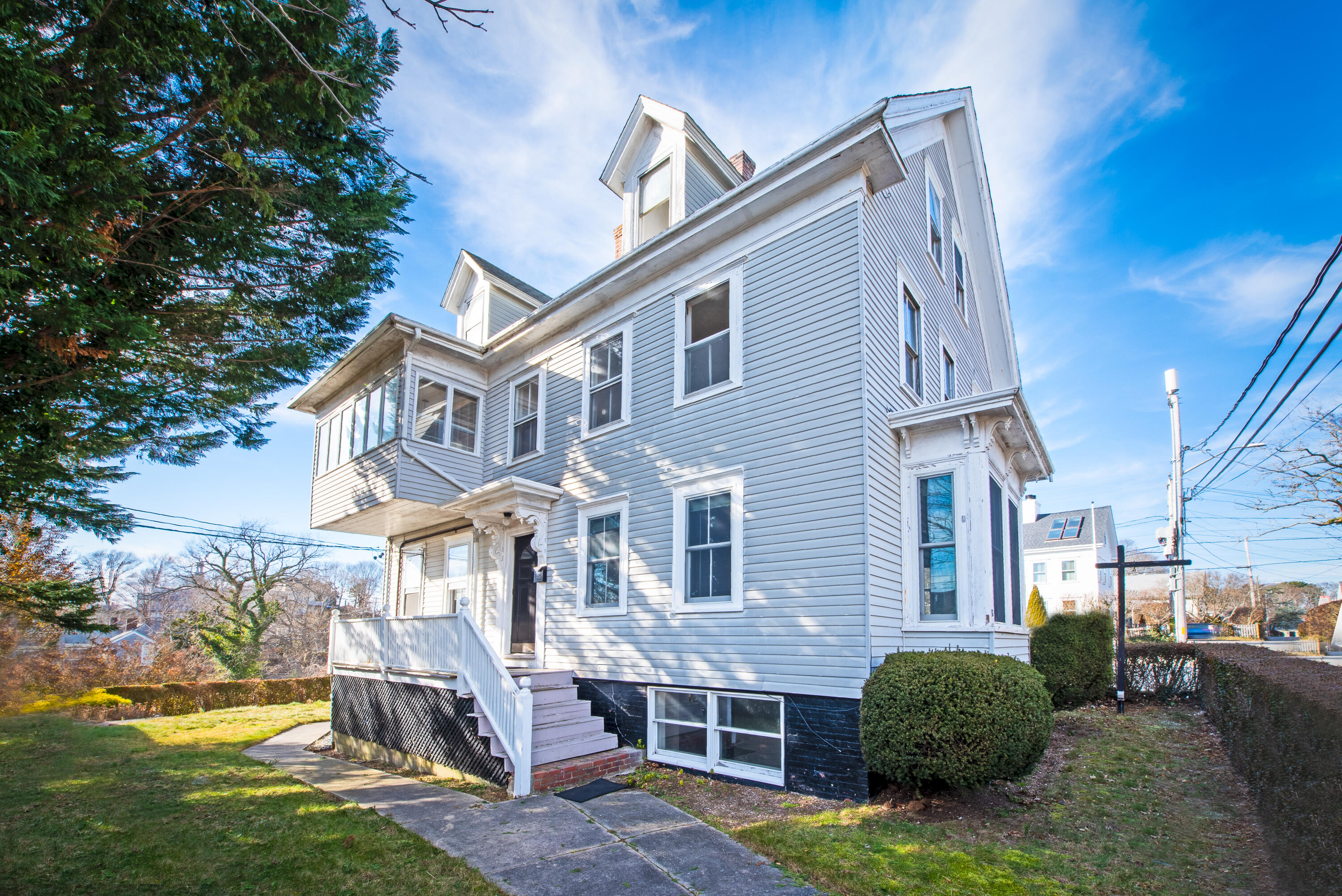 6 Bangs Street Provincetown, MA 02657 - Photo 1 of 36 a view of a big house with a yard and plants