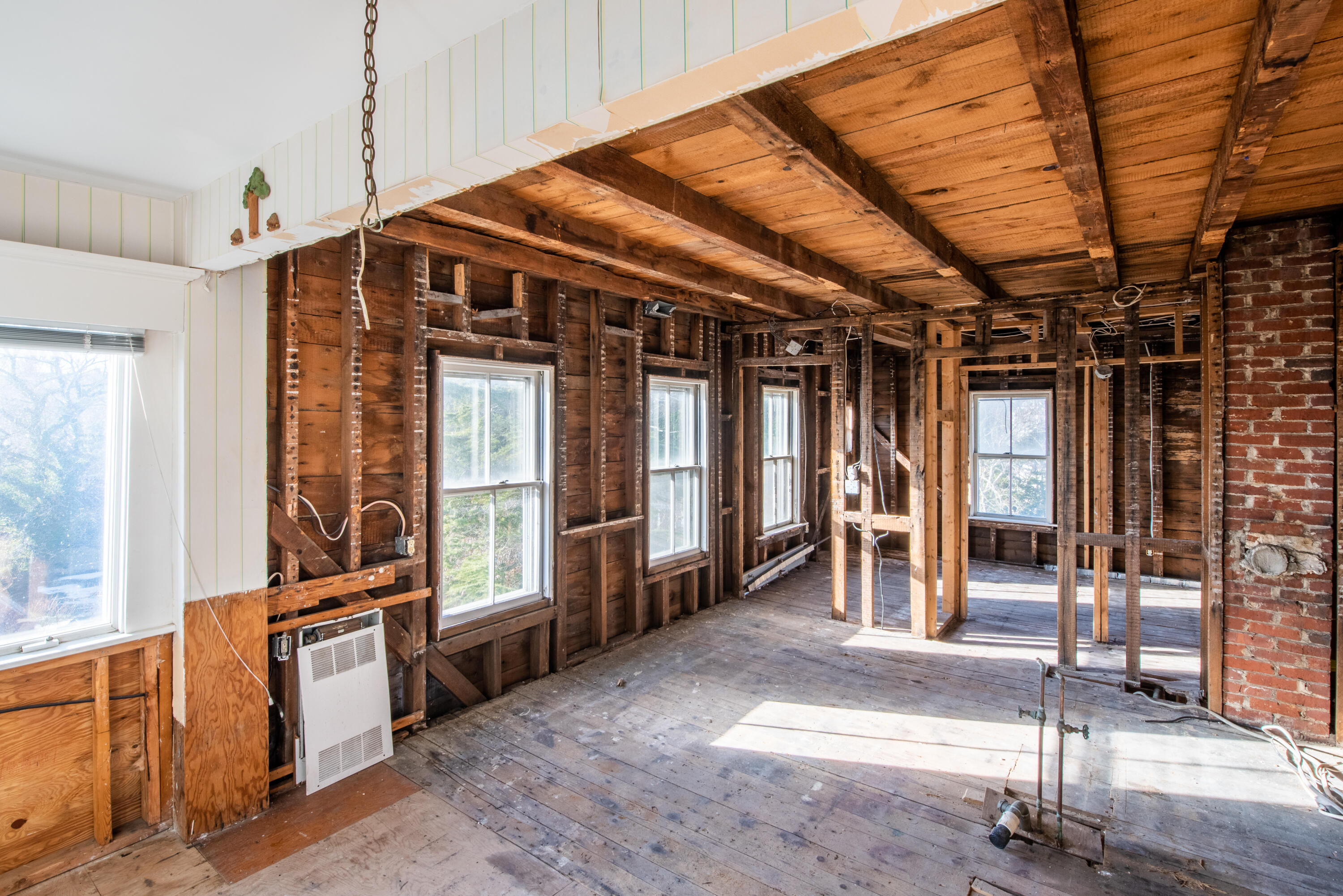 6 Bangs Street Provincetown, MA 02657 - Photo 25 of 36 a view of an empty room with wooden floor