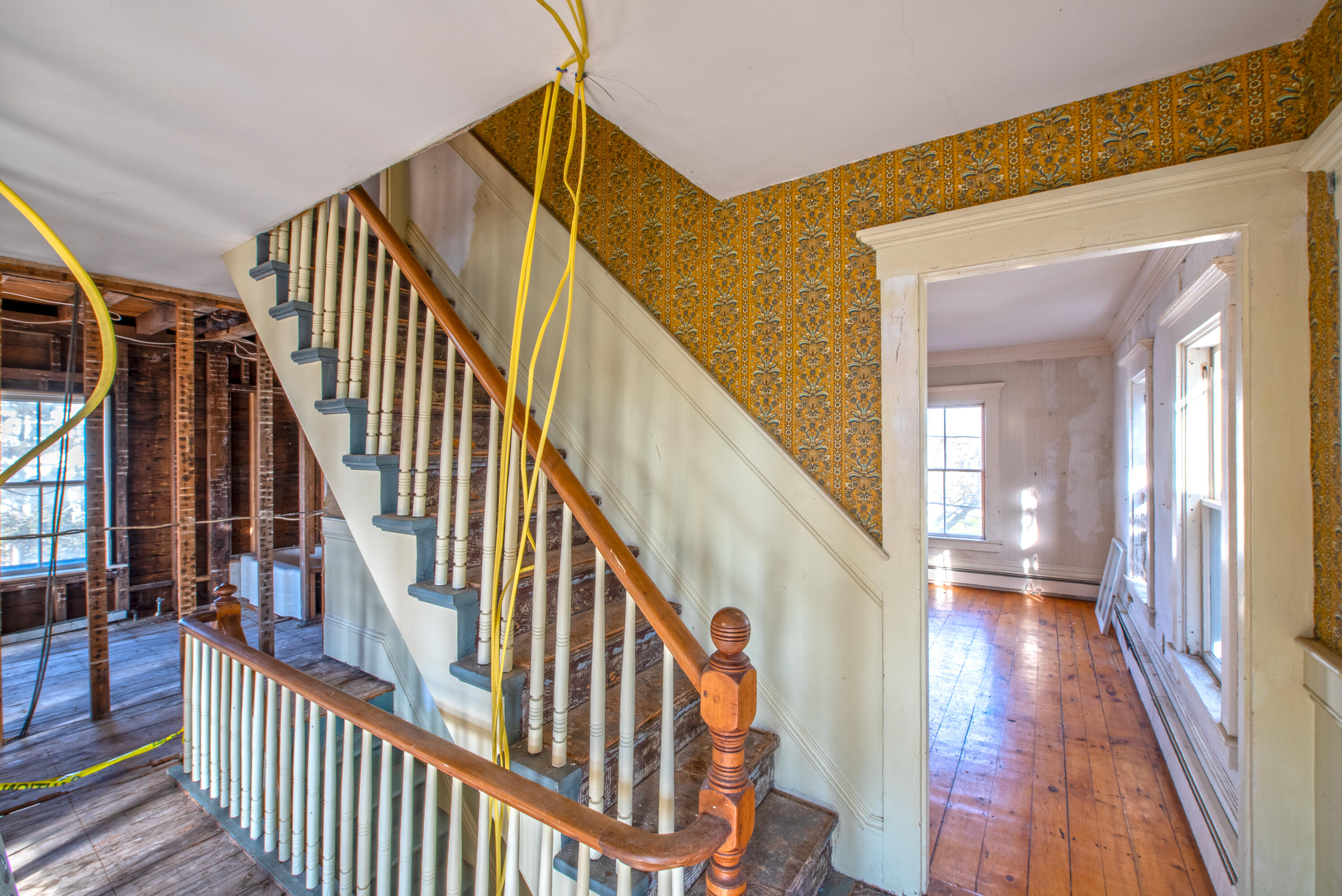 6 Bangs Street Provincetown, MA 02657 - Photo 26 of 36 a view of staircase with wooden floor and a chandelier