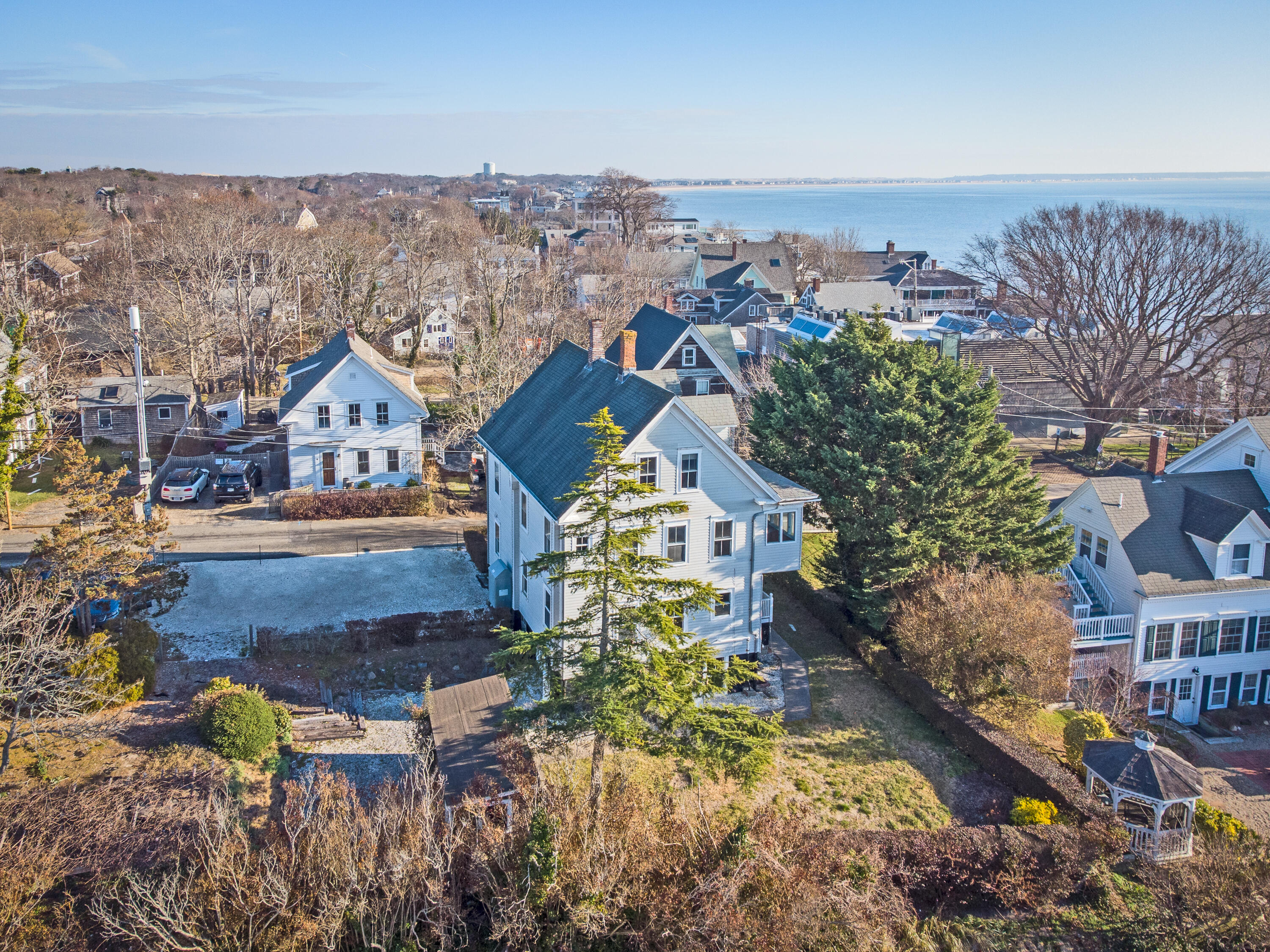 6 Bangs Street Provincetown, MA 02657 - Photo 8 of 36 an aerial view of residential houses with outdoor space and trees