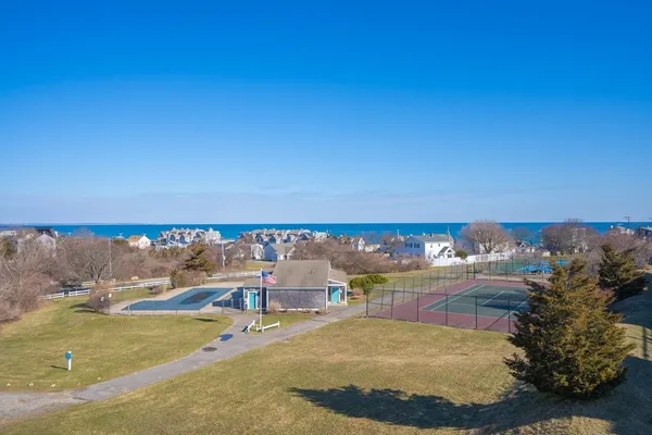a view of a swimming pool with an ocean view