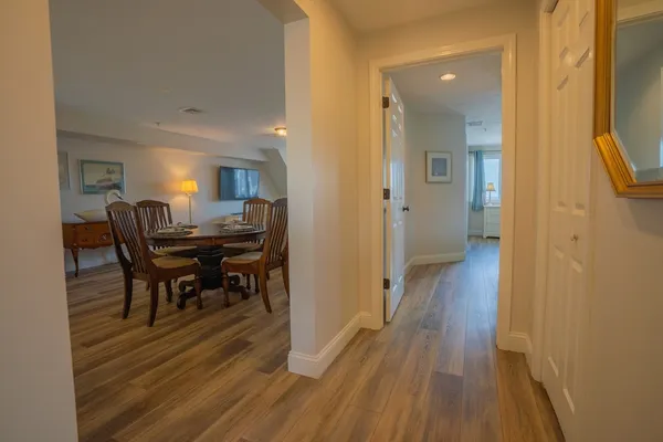 a view of a dining room with hardwood floor