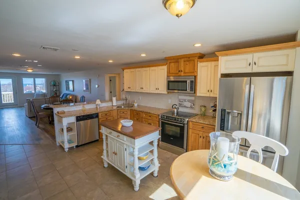 a kitchen with a sink and counter top space