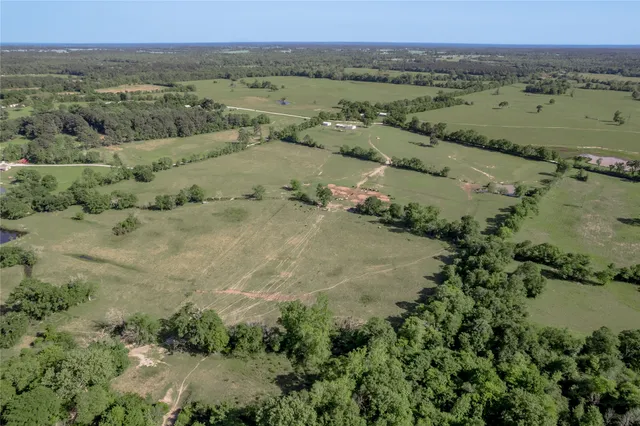 an aerial view of mountains and trees
