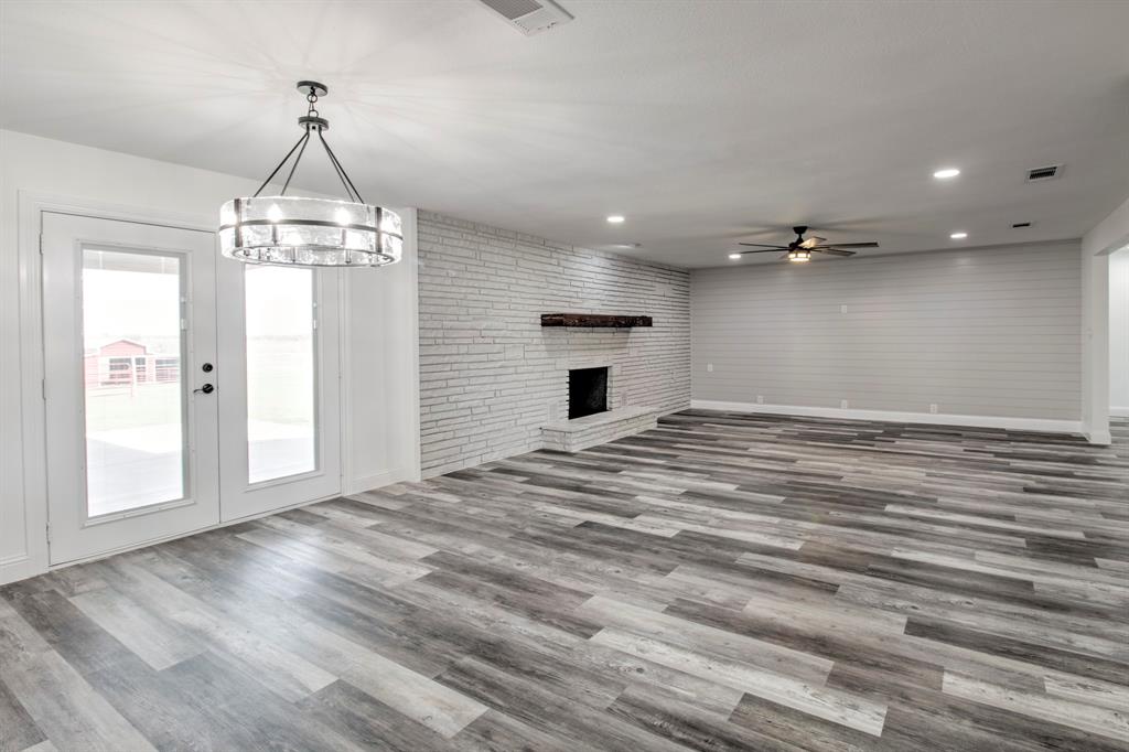 3884 Lois Road East Sanger, TX 76266 - Photo 11 of 40 Living Room/Dining area. Open space, with beautiful Flooring!