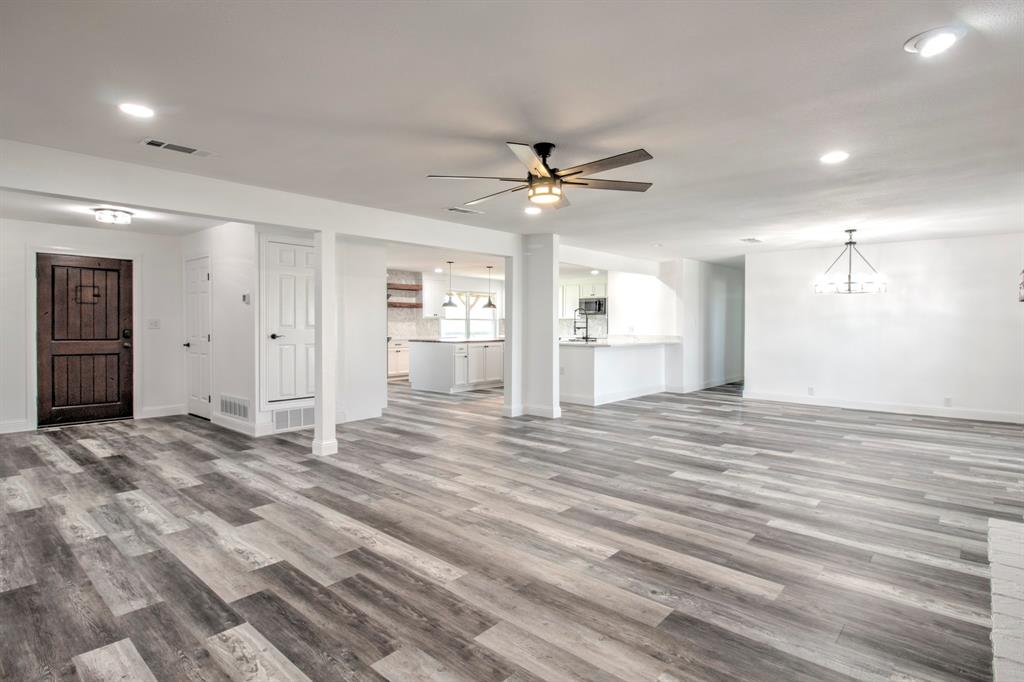3884 Lois Road East Sanger, TX 76266 - Photo 10 of 40 View in Living room looking into the Dining area, and kitchen.