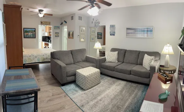 a living room with furniture and a couch