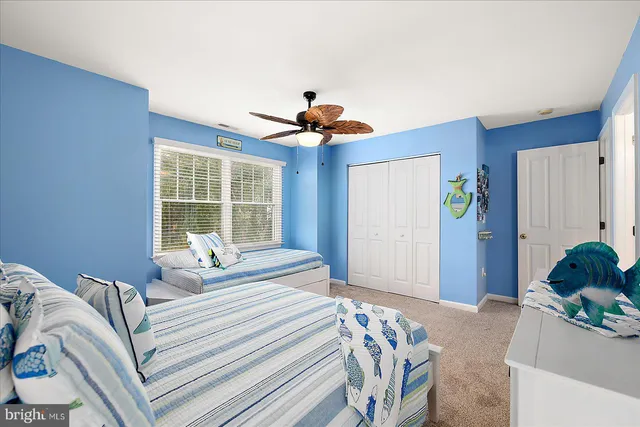 a view of a building with a yard