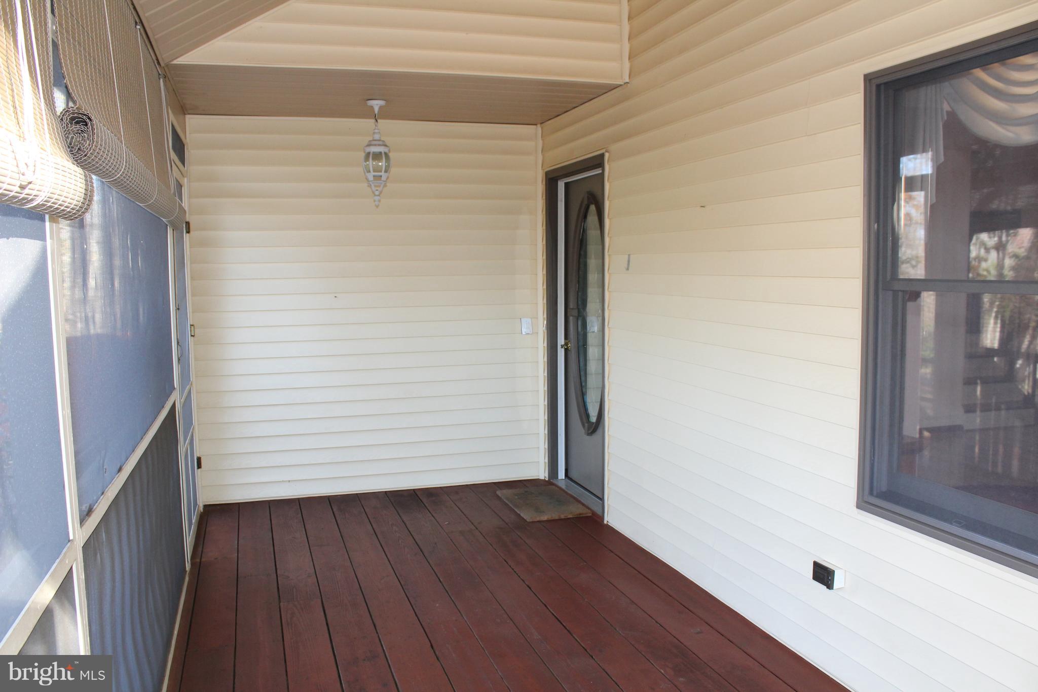 7760 Estevez Road La Plata, MD 20646 - Photo 63 of 89 screened front porch