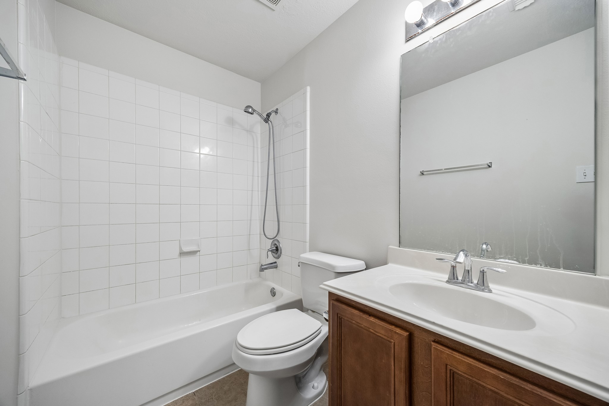 25211 Hazel Ranch Drive Katy, TX 77494 - Photo 10 of 10 a bathroom with a sink toilet and shower