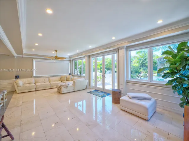 a bathroom with a sink mirror vanity and toilet