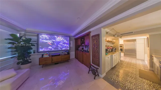 a view of a bedroom with wooden floor