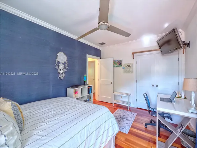 a view of entryway with wooden floor