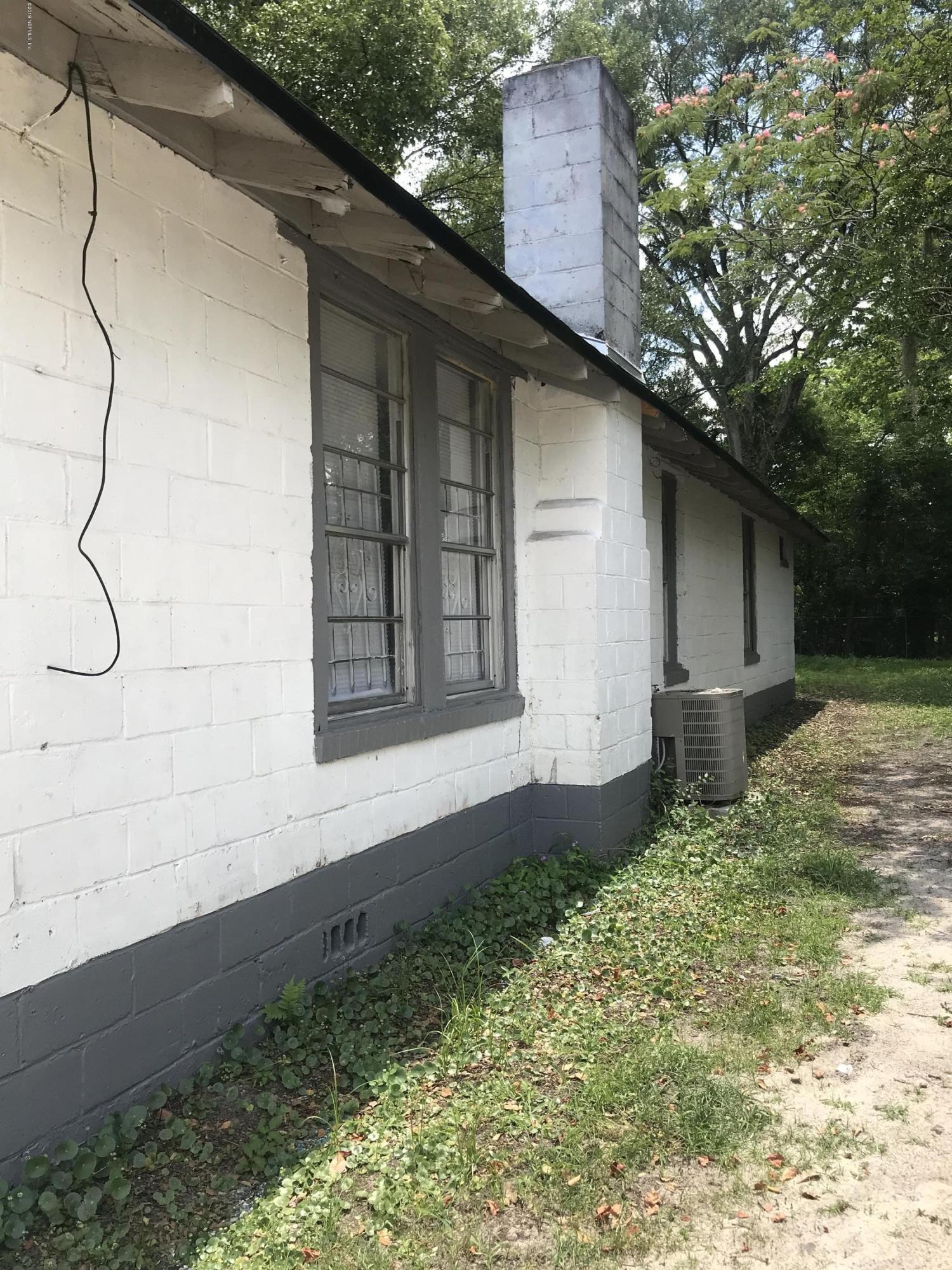 5606 Moncrief Road Jacksonville, FL 32209 - Photo 2 of 26 a house view with a backyard space