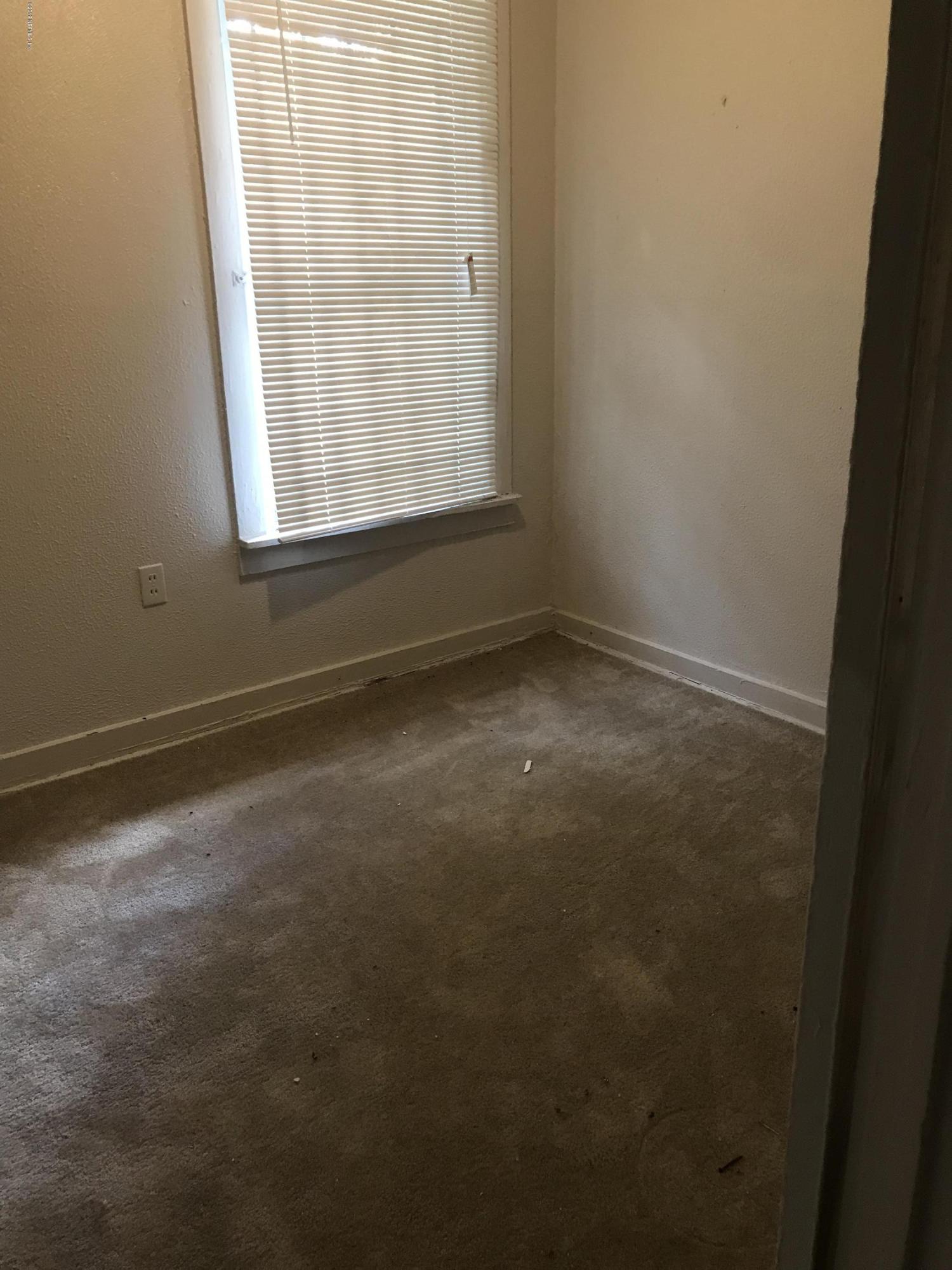 5606 Moncrief Road Jacksonville, FL 32209 - Photo 10 of 26 a view of room with window