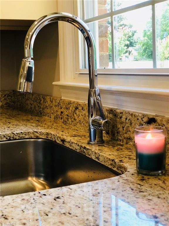 170 Paso Street Rural Hall, NC 27045 - Photo 11 of 26 Beautiful Granite and New Hardware pairs well together.