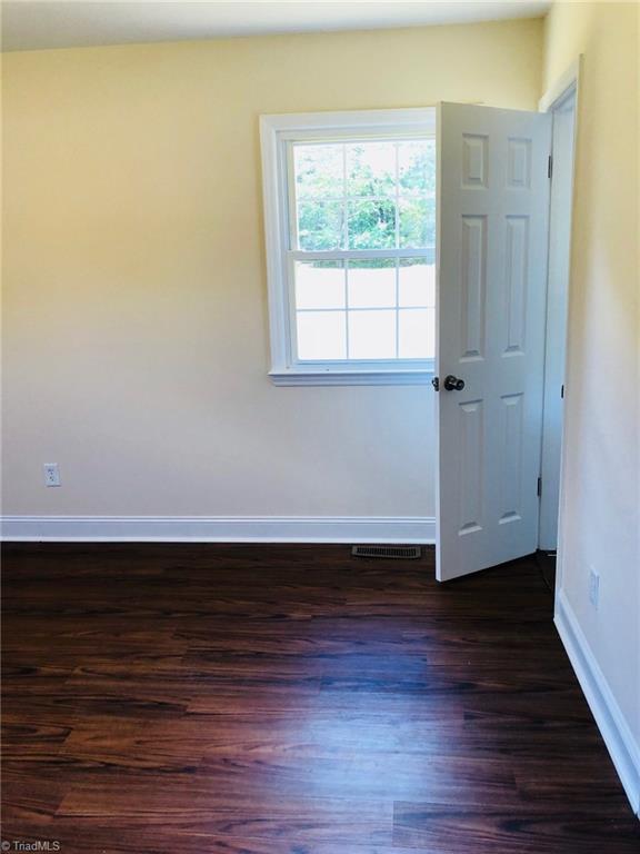 170 Paso Street Rural Hall, NC 27045 - Photo 19 of 26 There are two windows in the Master Bedroom making it full of sunshine. This is one window, door is access to the Master Bath