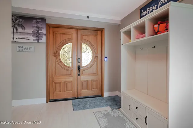a view of hallway with washer and dryer
