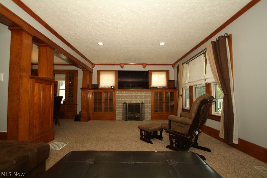 65 Hillman Road Akron, OH 44312 - Photo 6 of 25 Spacious Living Room with Fireplace