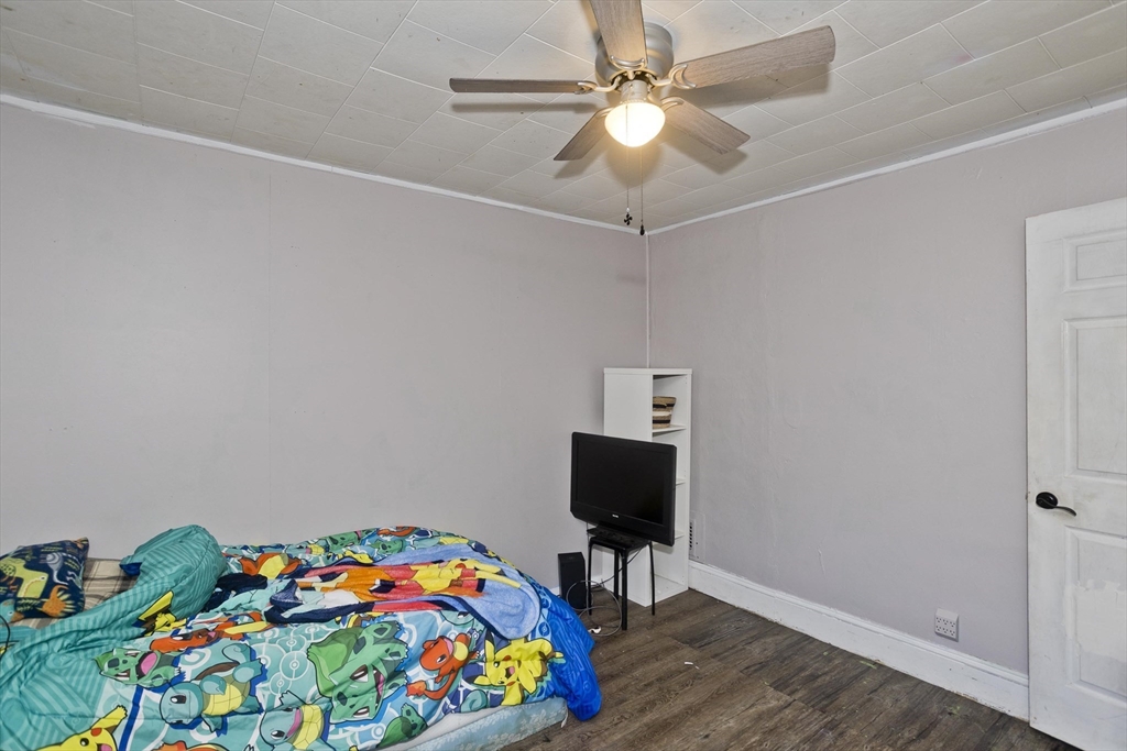 80 Stewart Street Chicopee, MA 01020 - Photo 23 of 37 a room with toys and flat screen tv