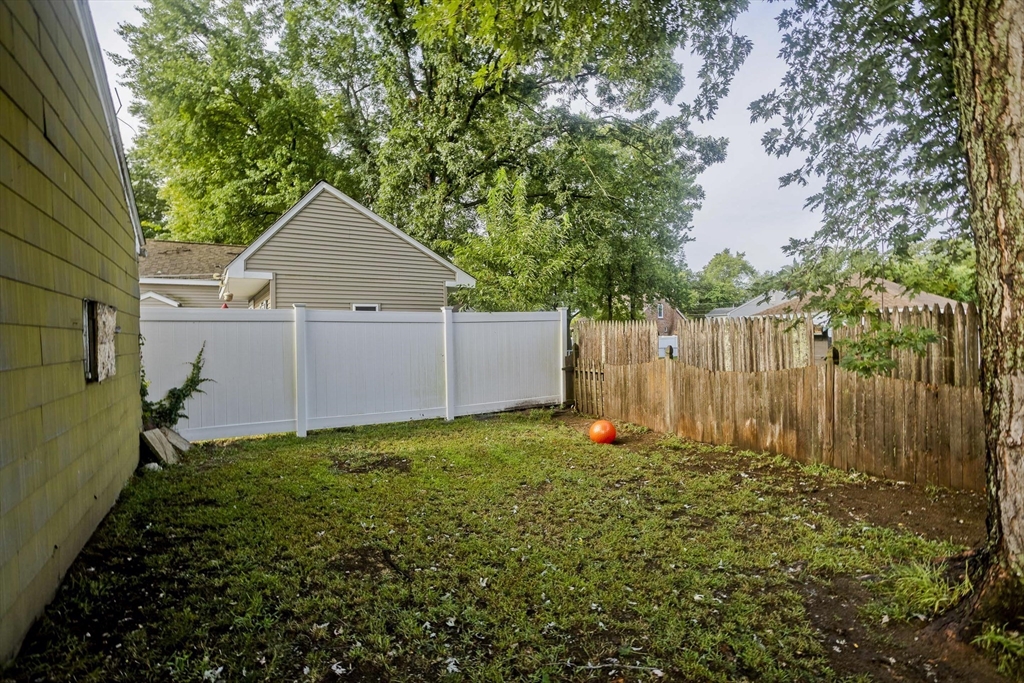 80 Stewart Street Chicopee, MA 01020 - Photo 37 of 37 a view of backyard with small cabin