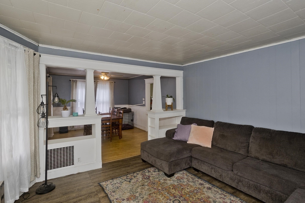 80 Stewart Street Chicopee, MA 01020 - Photo 7 of 37 a living room with furniture and a wooden floor