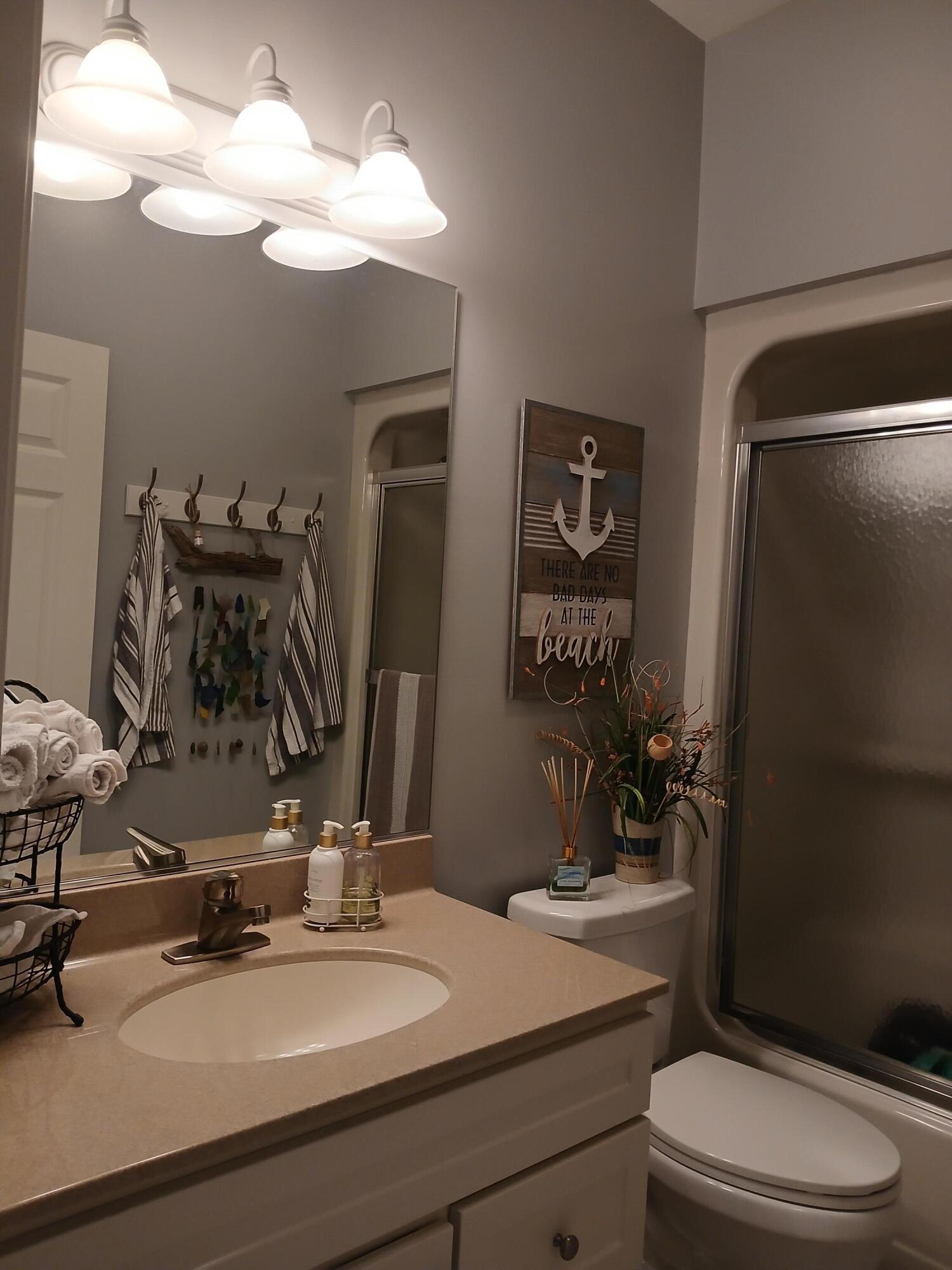 300 South Rath Avenue, Unit 5 Ludington, MI 49431 - Photo 17 of 28 Main Floor Guest Bath
