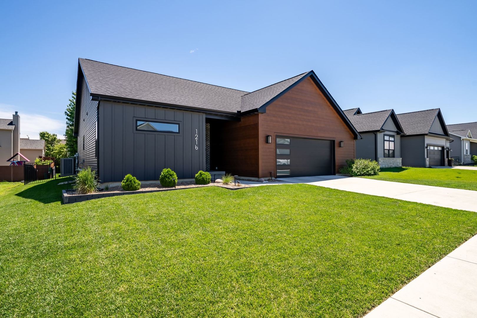 1216 Granite Way Normal, IL 61761 - Photo 1 of 33 a front view of house with yard and green space