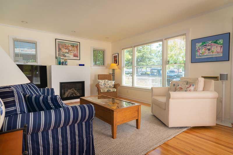 705 Oak Drive Capitola, CA 95010 - Photo 5 of 17 a living room with furniture fireplace and window