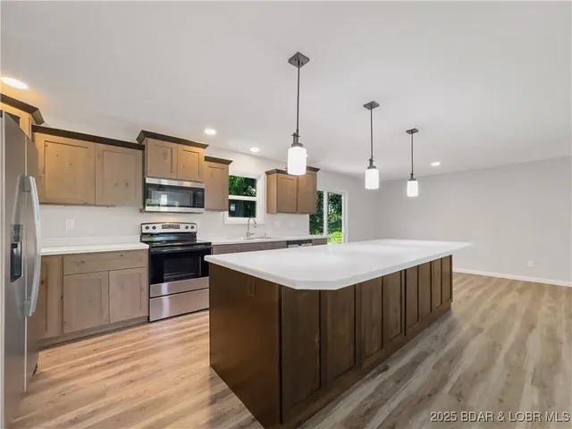 $340,000 | 326 State Road West, Macks Creek, MO 65786