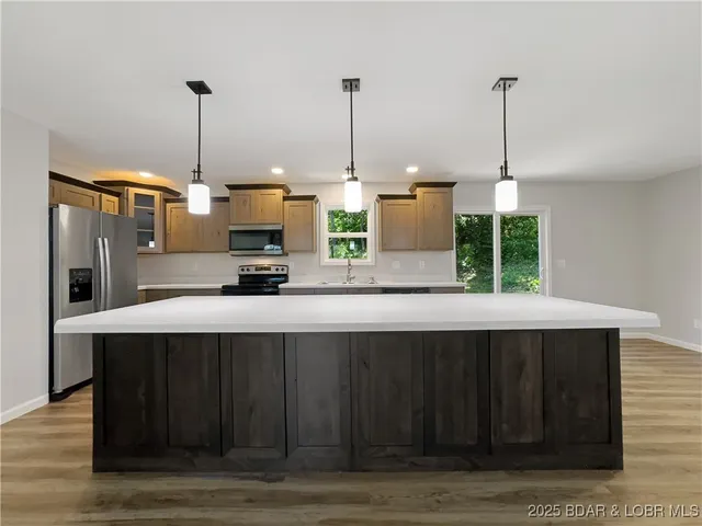 $340,000 | 326 State Road West, Macks Creek, MO 65786