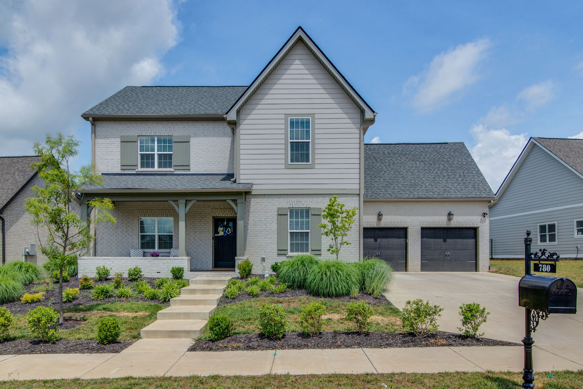 780 Plowson Road Mount Juliet, TN 37122 - Photo 1 of 41 a front view of a house with yard and parking