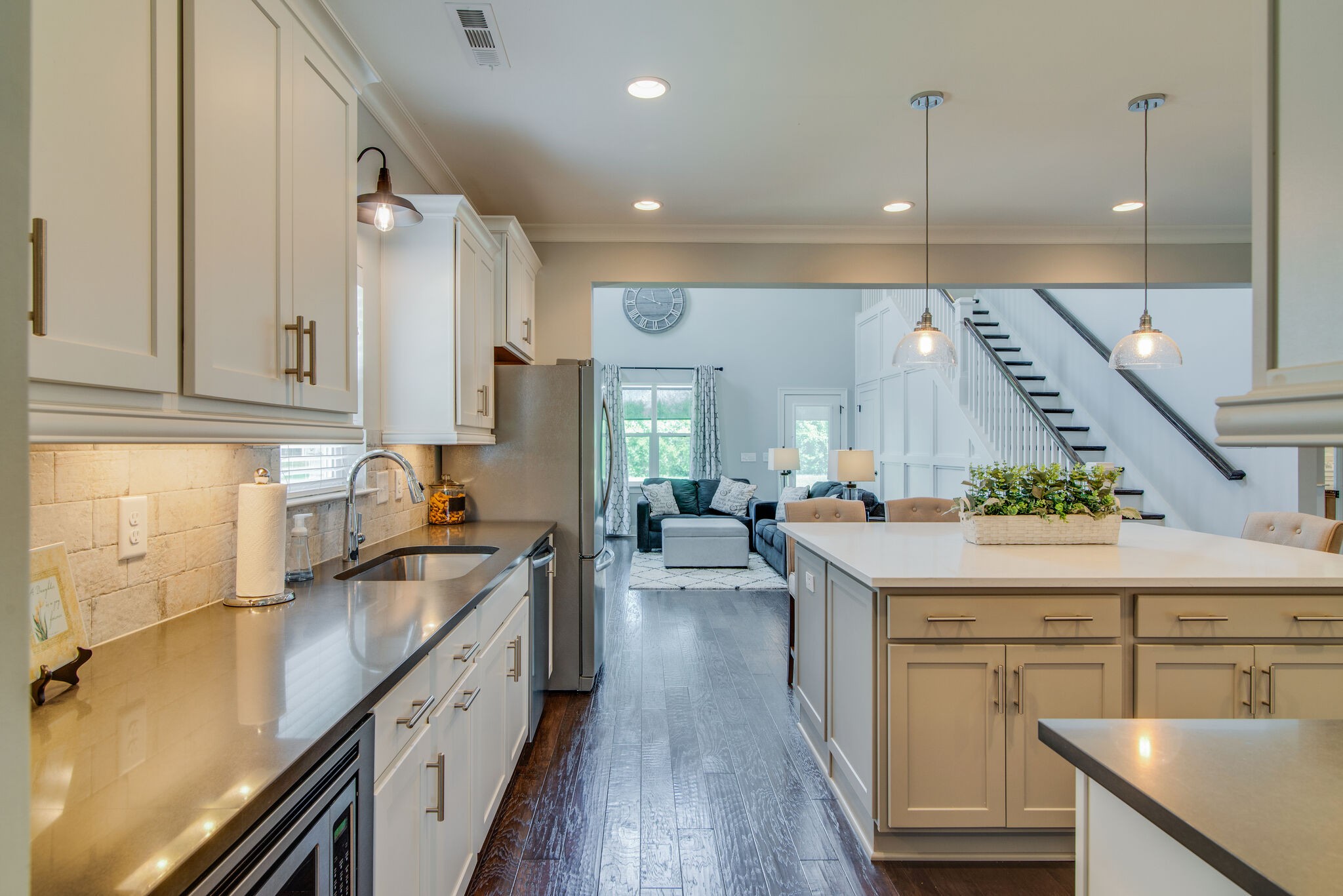 780 Plowson Road Mount Juliet, TN 37122 - Photo 12 of 41 a kitchen with stainless steel appliances granite countertop a lot of counter space and wooden floors