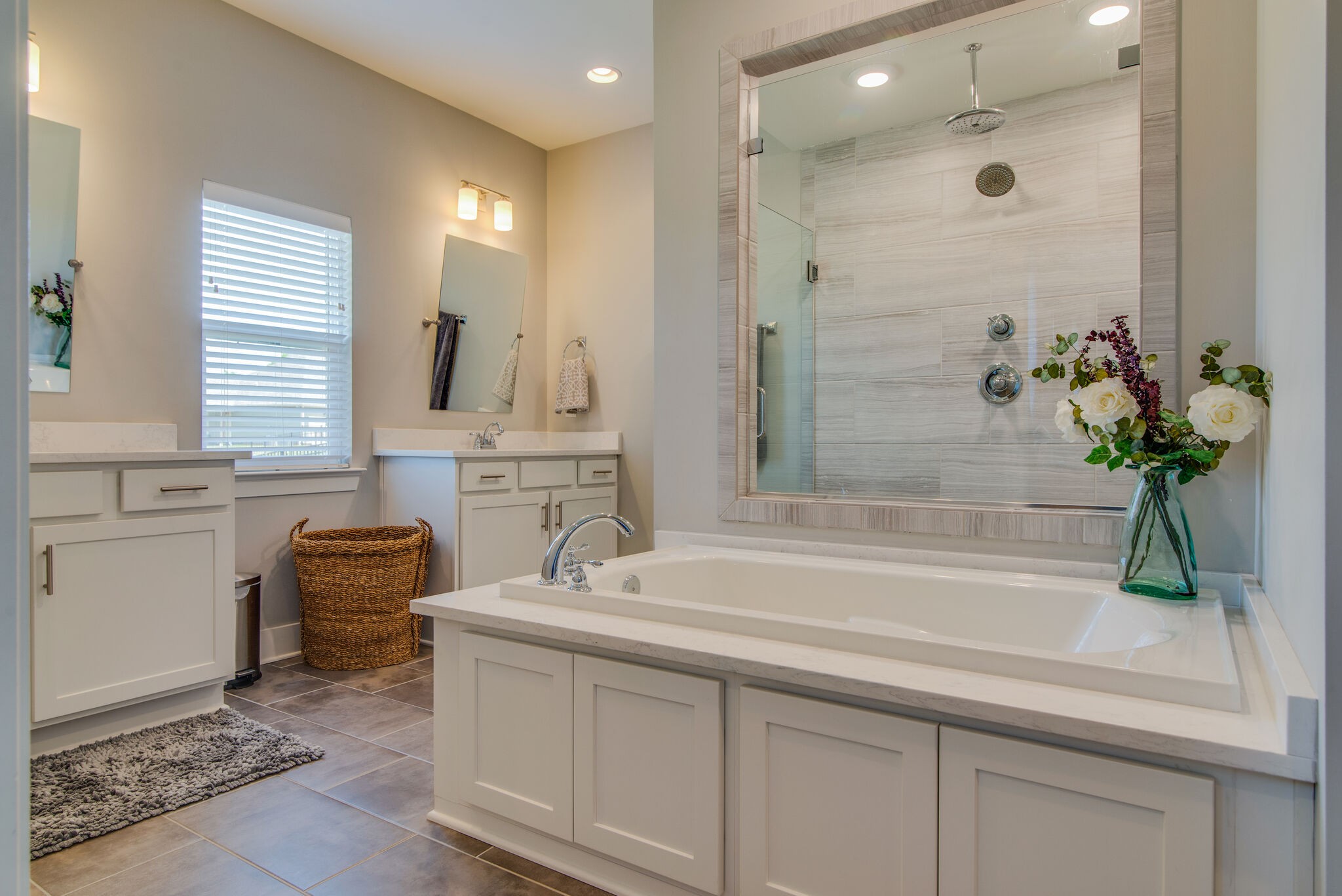 780 Plowson Road Mount Juliet, TN 37122 - Photo 20 of 41 a bathroom with a sink a faucet a potted plant and a shower
